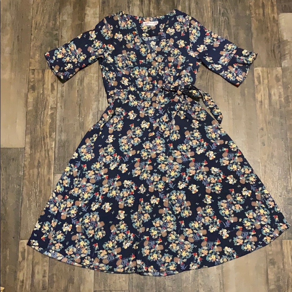 Floral print dress with side bow; never worn